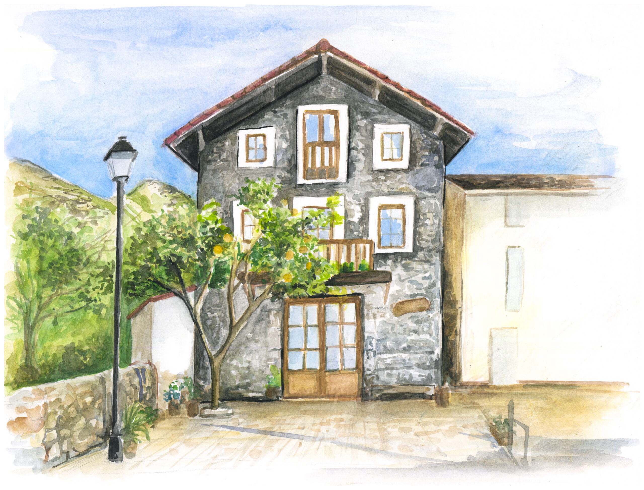 Casa rural de piedra con limonero